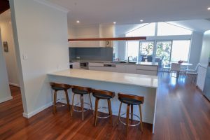 kitchen with seats and benchtop