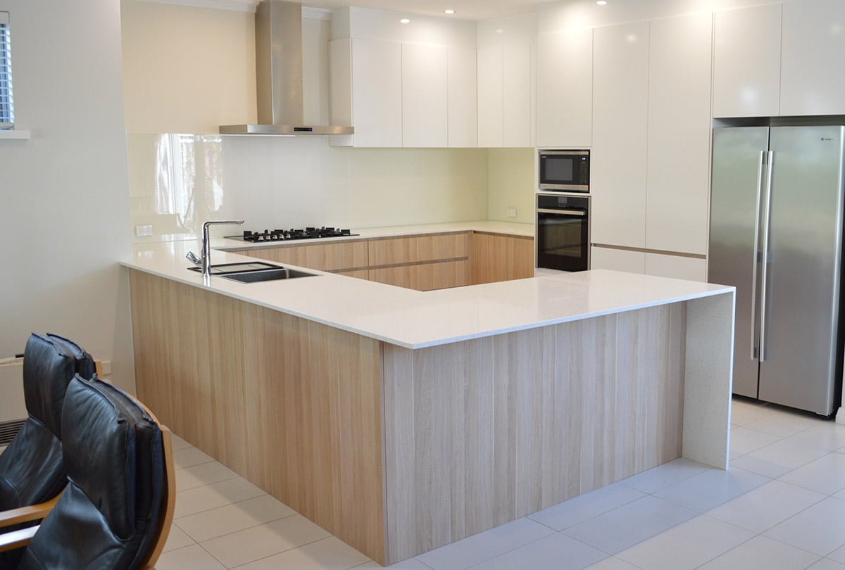 Stunning Engineered Benchtop and Waterfall Slab End by Kitchens Perth